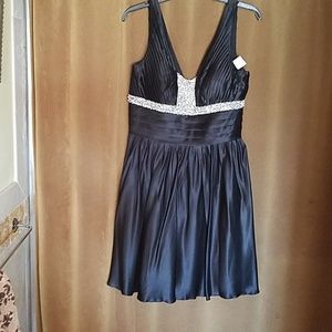 Boutique black dress embellished with silver